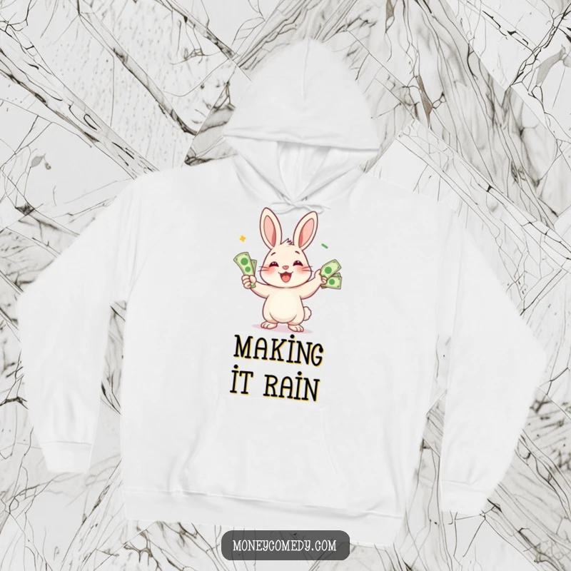 Funny rabbit hoodie featuring a smiling character juggling bills, offering cozy financial cheer and humor.